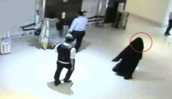 femme voilée, femme portant le niqab, centre de Daech