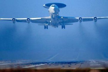A Nato AWACS plane takes off the NATO Airbase in Geilenkirchen, Germany, Wednesday, March 12, 2014. AWACS planes flying out of Geilenkirchen to patrol over Romania and Poland. (AP Photo/Frank Augstein)