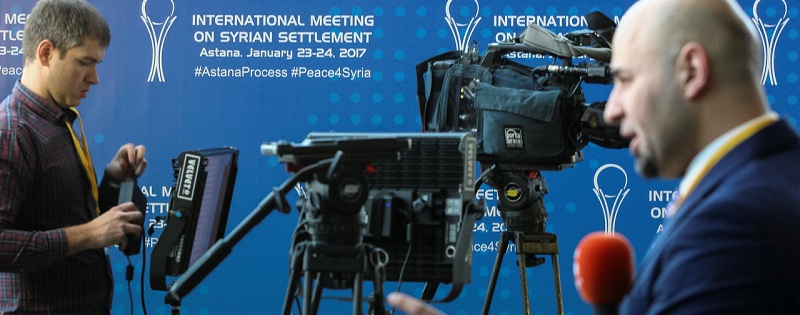Reporters work in the media center set for Syria peace talks, in Astana, Kazakhstan, January 23, 2017. REUTERS/Mukhtar Kholdorbekov