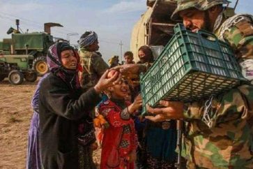 الحشد الشعبي يغيث النازحين في تلعفر