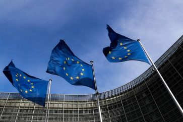European Union flags flutter outside the EU Commission headquarters in Brussels, Belgium, March 12, 2018. REUTERS/Yves Herman