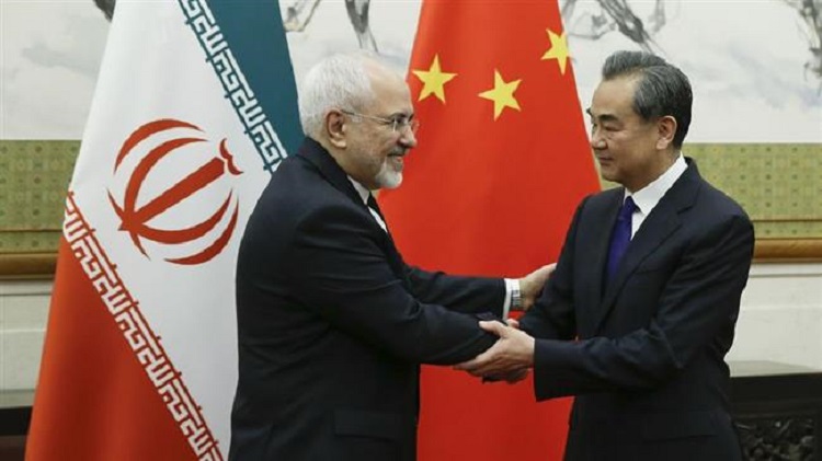 Le ministre iranien des Affaires étrangères, Mohammad Javad Zarif, et son homologue chinois, Wang Yi, à Pékin en mai 2018. ©Reuters