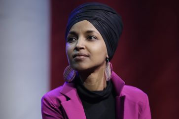 FILE - In this Jan. 31, 2020, file photo, Rep. Ilhan Omar, D-Minn., participates in a panel during a campaign event for Democratic presidential candidate Sen. Bernie Sanders in Clive, Iowa. Omar on Monday, June 15, announced the death of her father due to complications from COVID-19. In a statement, Omar said Nur Omar Mohamed died Monday. She gave no additional information. (AP Photo/Marcio Jose Sanchez, File)