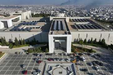 Une vue aérienne de l'entrée du palais présidentiel syrien. ©AFP